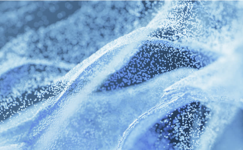 A digital image of blue particles, symbolizing how targeted nutrients are delivered to the oral microbiome